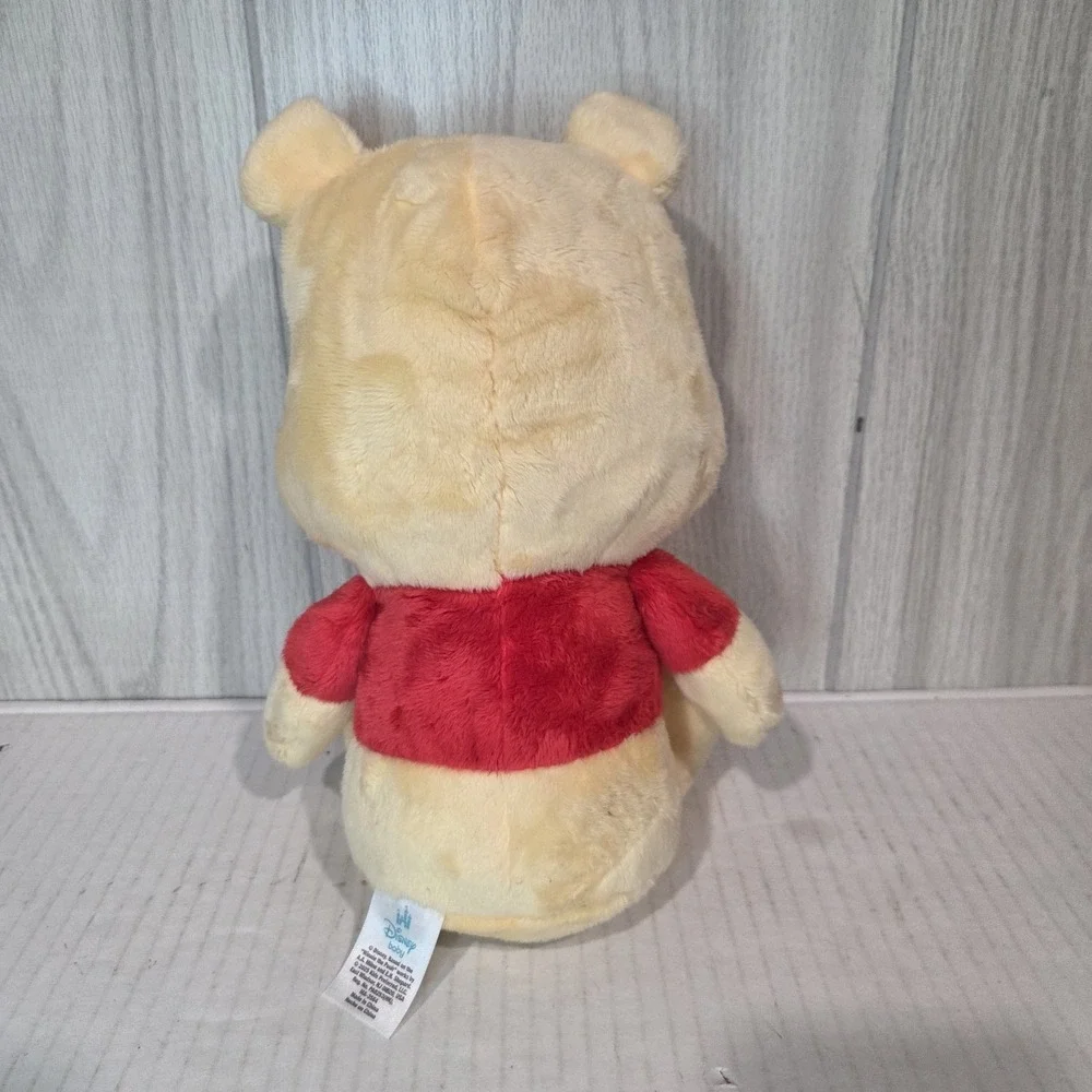 Disney Baby Winnie the Pooh Stuffed Animal, crinkle hands, heart emblemed